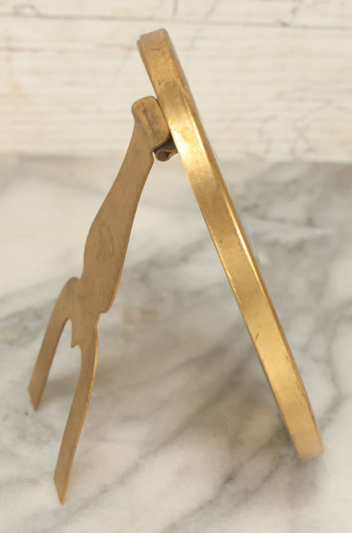 Lot 127 - Antique Framed Portrait Photo Of A Pretty Young Smiling Woman In A Brass Frame By John Wanamaker, 4-1/4" x 5-5/8"