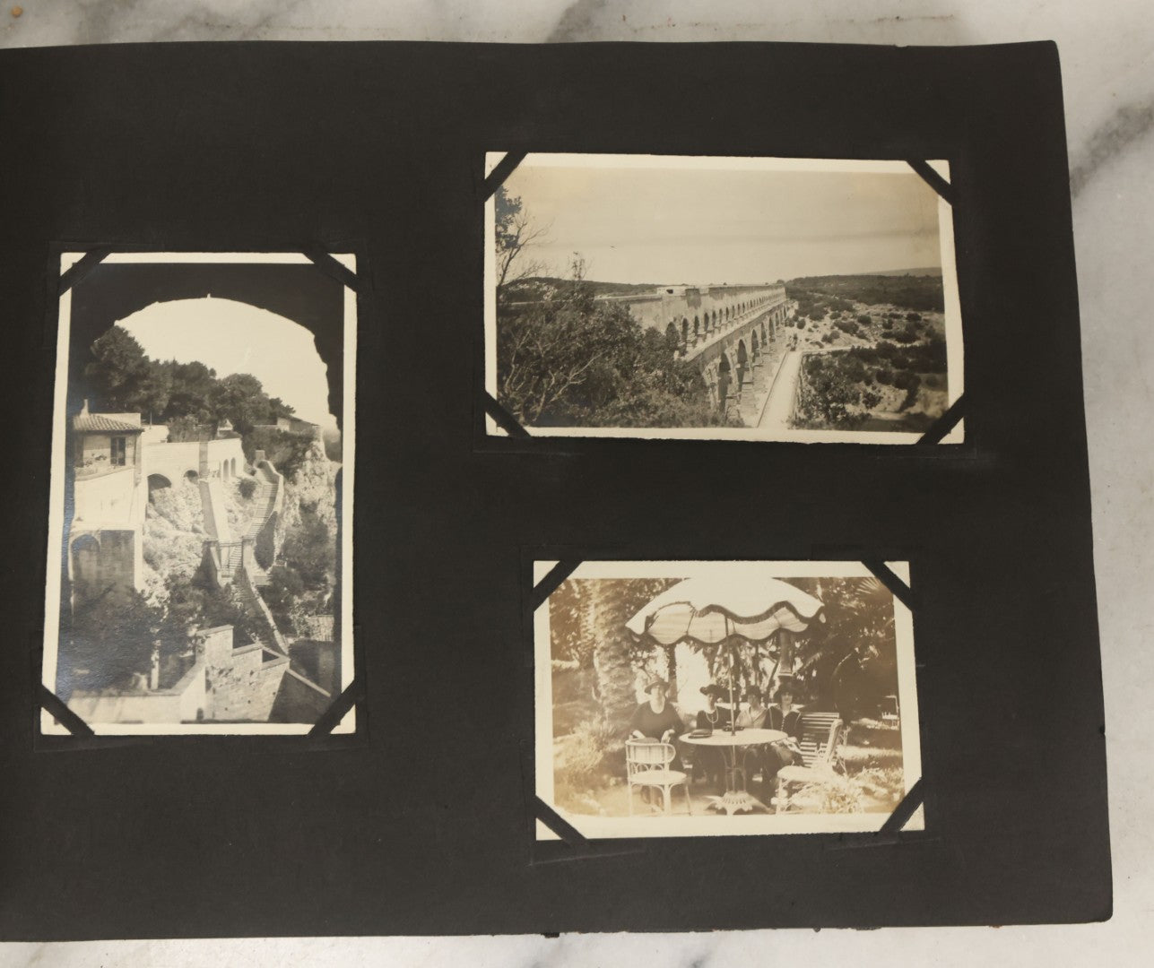 Lot 136 - Antique Black Photo Album With Detached Cover And Many Snapshot Photographs Of A Trip To Europe, Italy, Etc., Including Photos Of Ruins, Circa 1920s (All Pages Pictured) 