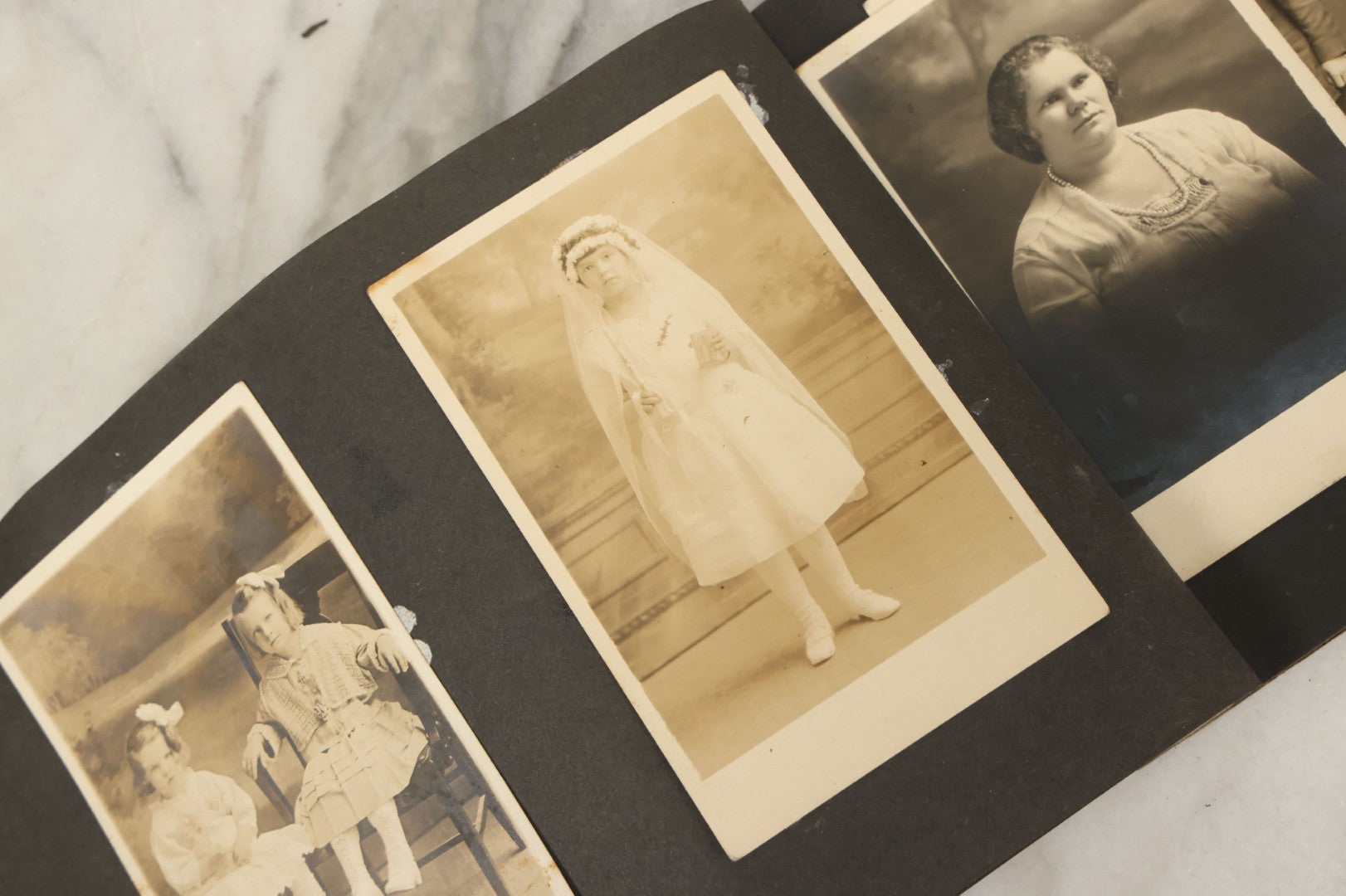 Lot 138 - Antique Brown Photo Album With Mostly Real Photo Postcards R.P.P.C. And Cyanotypes, Including First Communion Photos And More (All Pages Pictured)