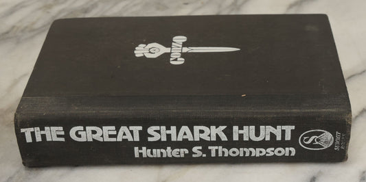 Lot 162 - "The Great Shark Hunt: Strange Tales From A Strange Time" Vintage Book By Hunter S. Thompson, With Gonzo Journalism Symbol On Cover, A Rolling Stone Press Book, Summit Books, New York,1979 