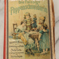 Lot 166 - "The Hard Working Doll Tailor: Instructions And Whispers How To Dress A Doll" Antique German Book By Julie Lutz, Fifth Edition, With Full Color Plates