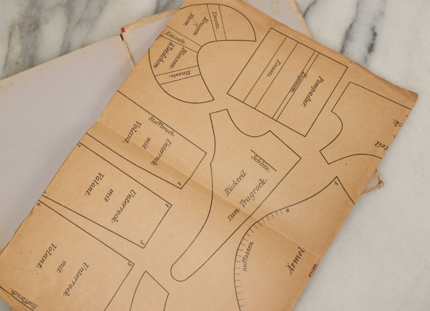 Lot 166 - "The Hard Working Doll Tailor: Instructions And Whispers How To Dress A Doll" Antique German Book By Julie Lutz, Fifth Edition, With Full Color Plates