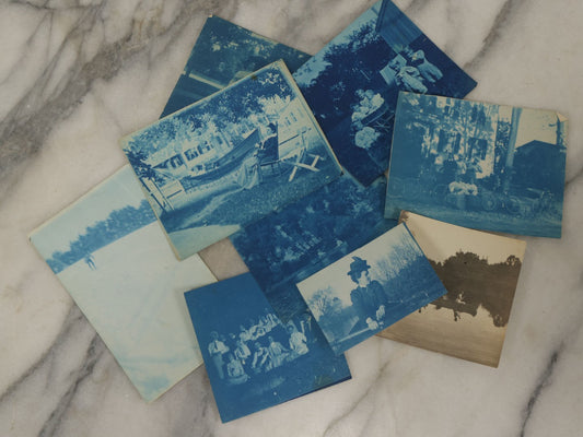 Lot 170 - Grouping Of 9 Snapshot Photographs Including 8 Cyanotypes Of Victorian Women And Children, Women With Bicycles, Skiing, Etc.