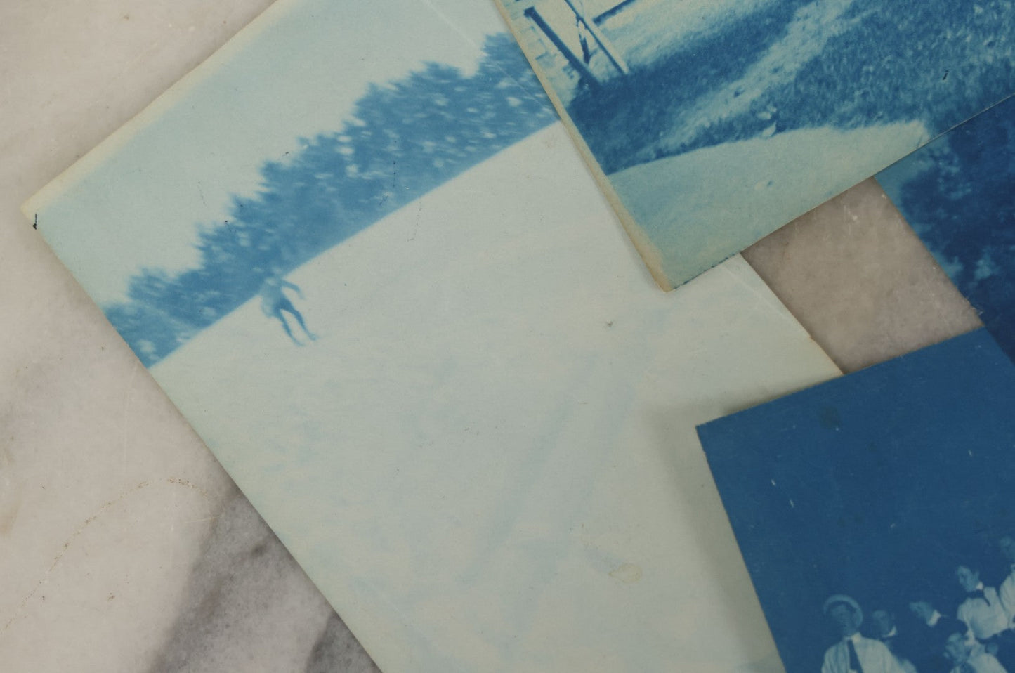 Lot 170 - Grouping Of 9 Snapshot Photographs Including 8 Cyanotypes Of Victorian Women And Children, Women With Bicycles, Skiing, Etc.