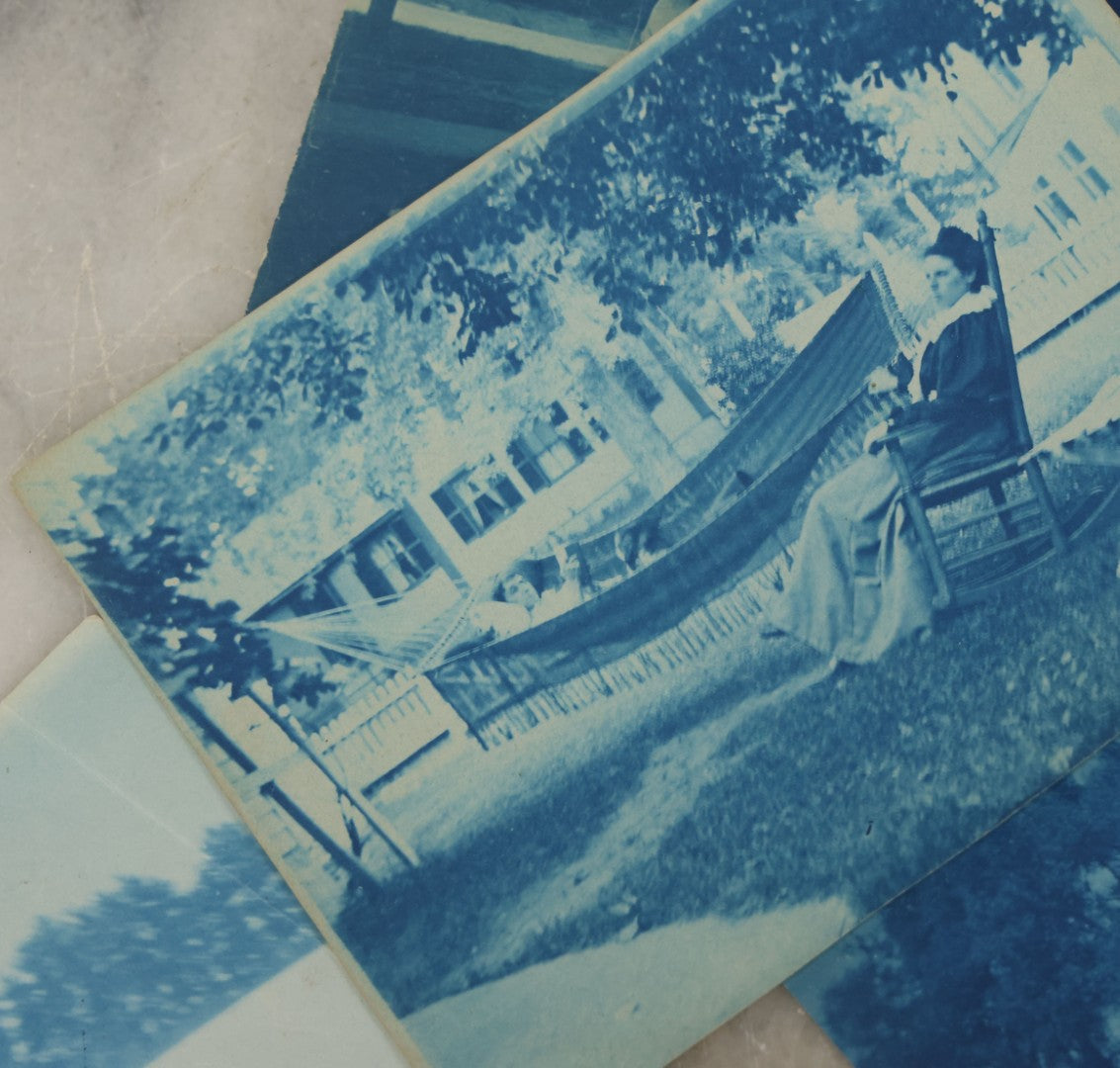Lot 170 - Grouping Of 9 Snapshot Photographs Including 8 Cyanotypes Of Victorian Women And Children, Women With Bicycles, Skiing, Etc.