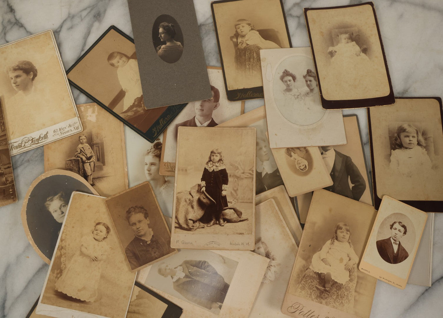 Lot 171 - Grouping Of 20+ Cabinet Card And Carte De Visite C.D.V. Photographs Of Men, Women, And Children, Including Little Girl With Hat, Smiling Toddler, And More