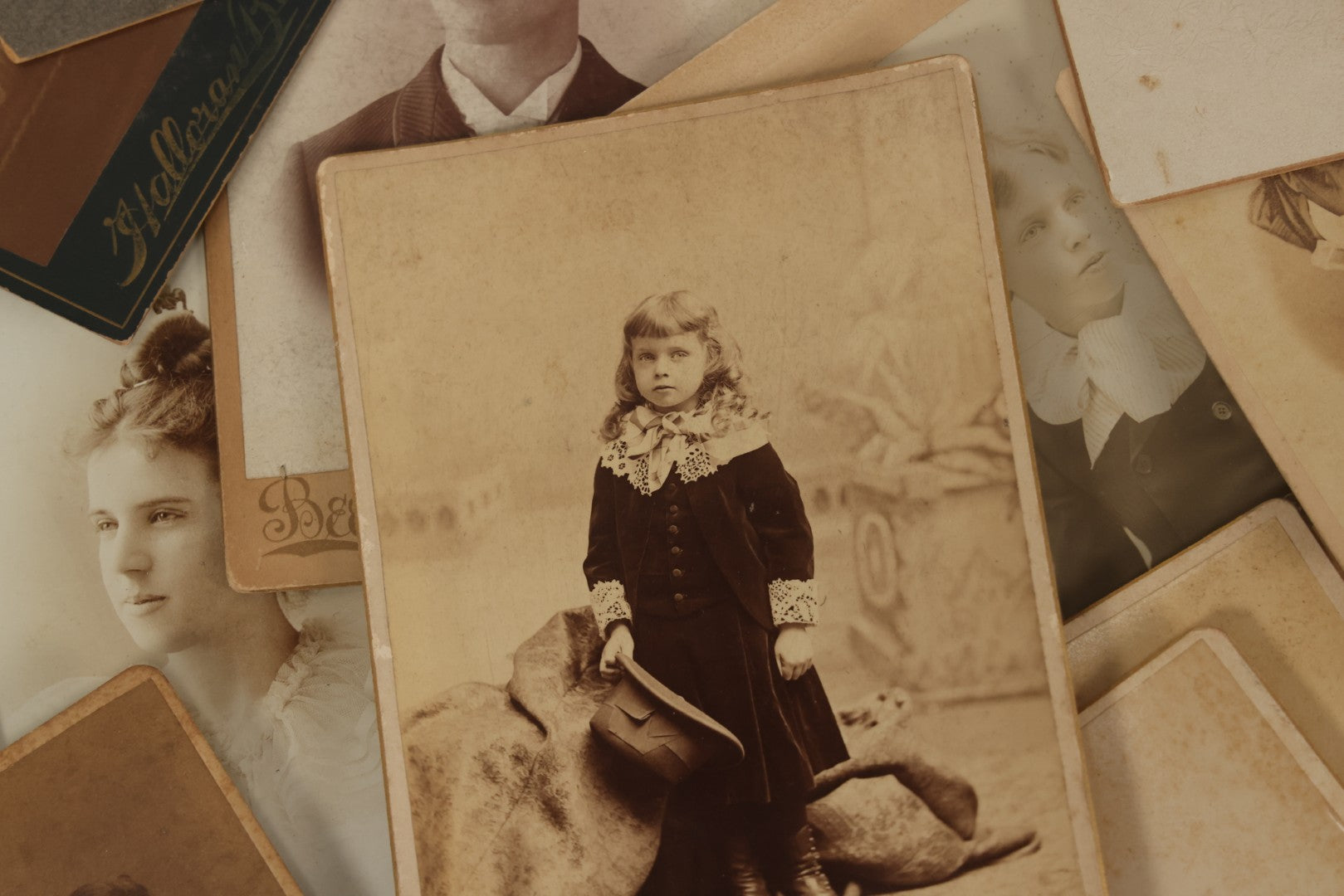 Lot 171 - Grouping Of 20+ Cabinet Card And Carte De Visite C.D.V. Photographs Of Men, Women, And Children, Including Little Girl With Hat, Smiling Toddler, And More