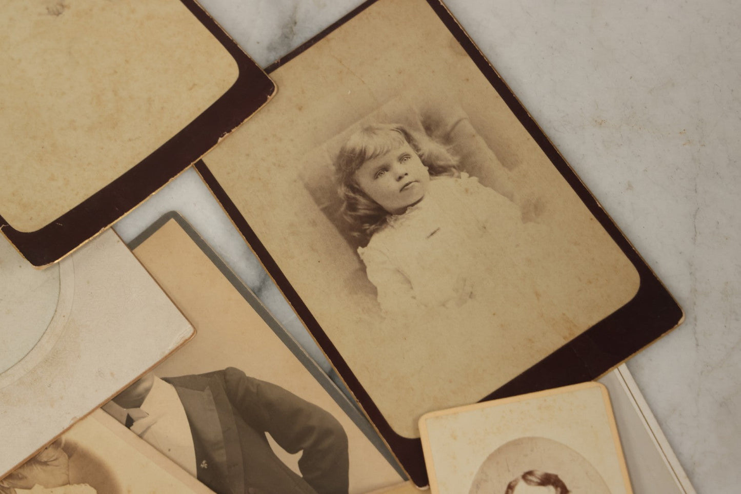 Lot 171 - Grouping Of 20+ Cabinet Card And Carte De Visite C.D.V. Photographs Of Men, Women, And Children, Including Little Girl With Hat, Smiling Toddler, And More