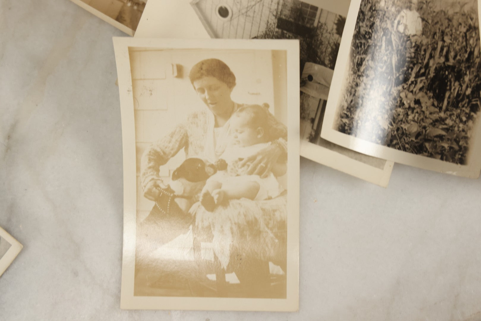Lot 173 - Grouping Of 20+ Vintage And Antique Snapshot Photographs Including Boy With Baseball Bat, Boy With Bugle, Boy With Plane, Boy Riding Bike, Old Man In Stovepipe Hat, Etc.