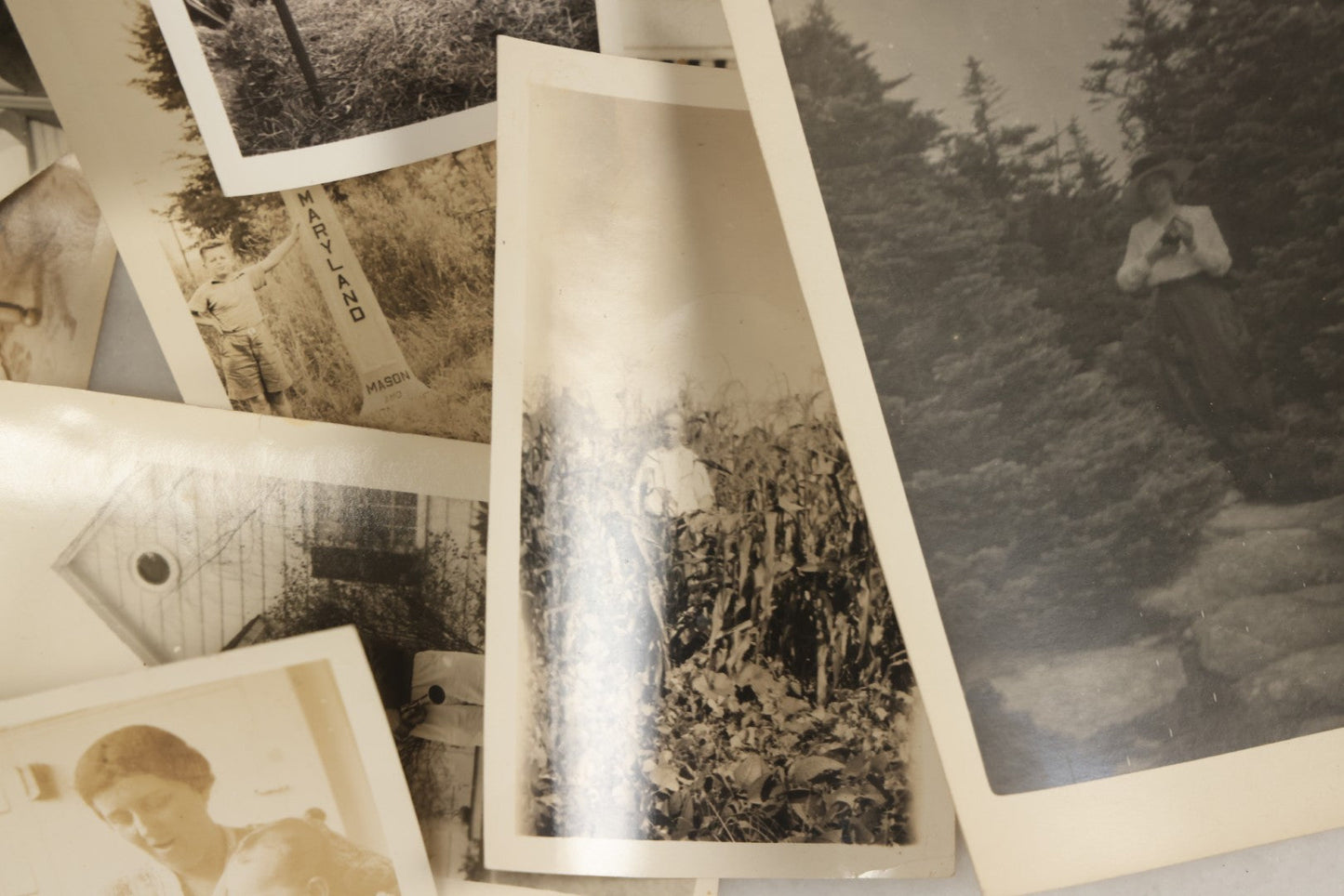 Lot 173 - Grouping Of 20+ Vintage And Antique Snapshot Photographs Including Boy With Baseball Bat, Boy With Bugle, Boy With Plane, Boy Riding Bike, Old Man In Stovepipe Hat, Etc.