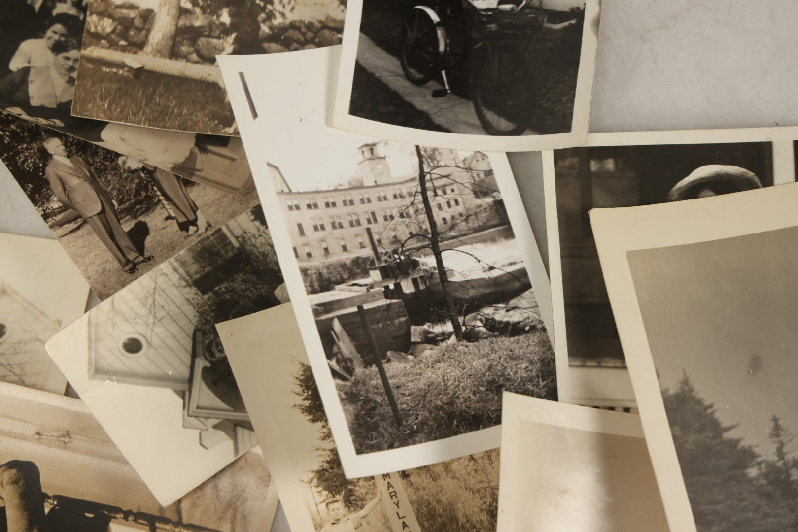 Lot 173 - Grouping Of 20+ Vintage And Antique Snapshot Photographs Including Boy With Baseball Bat, Boy With Bugle, Boy With Plane, Boy Riding Bike, Old Man In Stovepipe Hat, Etc.
