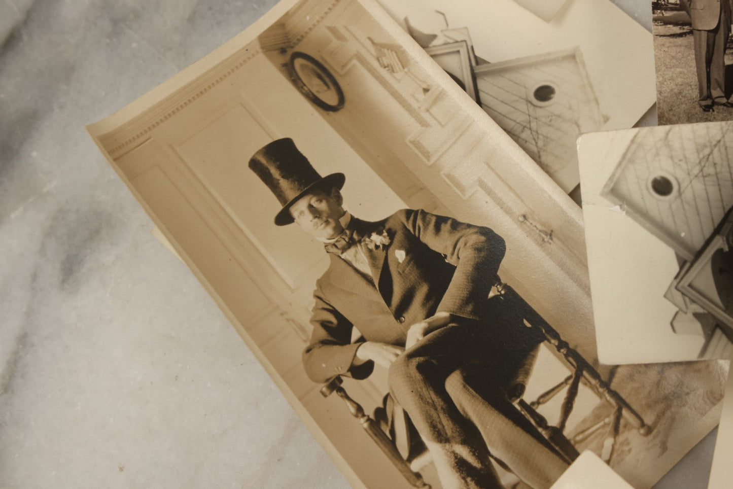 Lot 173 - Grouping Of 20+ Vintage And Antique Snapshot Photographs Including Boy With Baseball Bat, Boy With Bugle, Boy With Plane, Boy Riding Bike, Old Man In Stovepipe Hat, Etc.