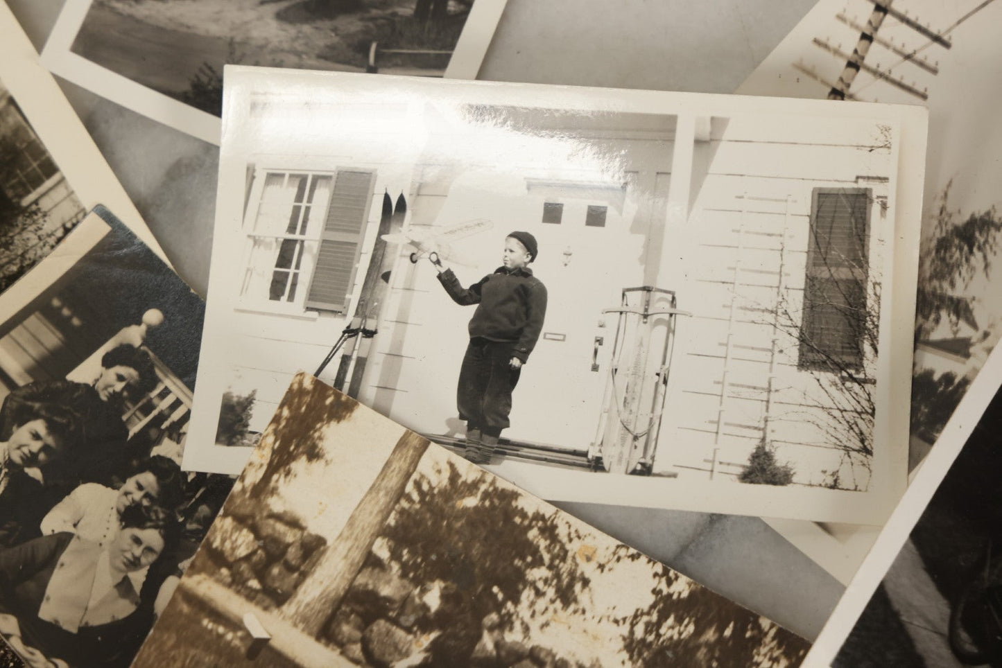 Lot 173 - Grouping Of 20+ Vintage And Antique Snapshot Photographs Including Boy With Baseball Bat, Boy With Bugle, Boy With Plane, Boy Riding Bike, Old Man In Stovepipe Hat, Etc.