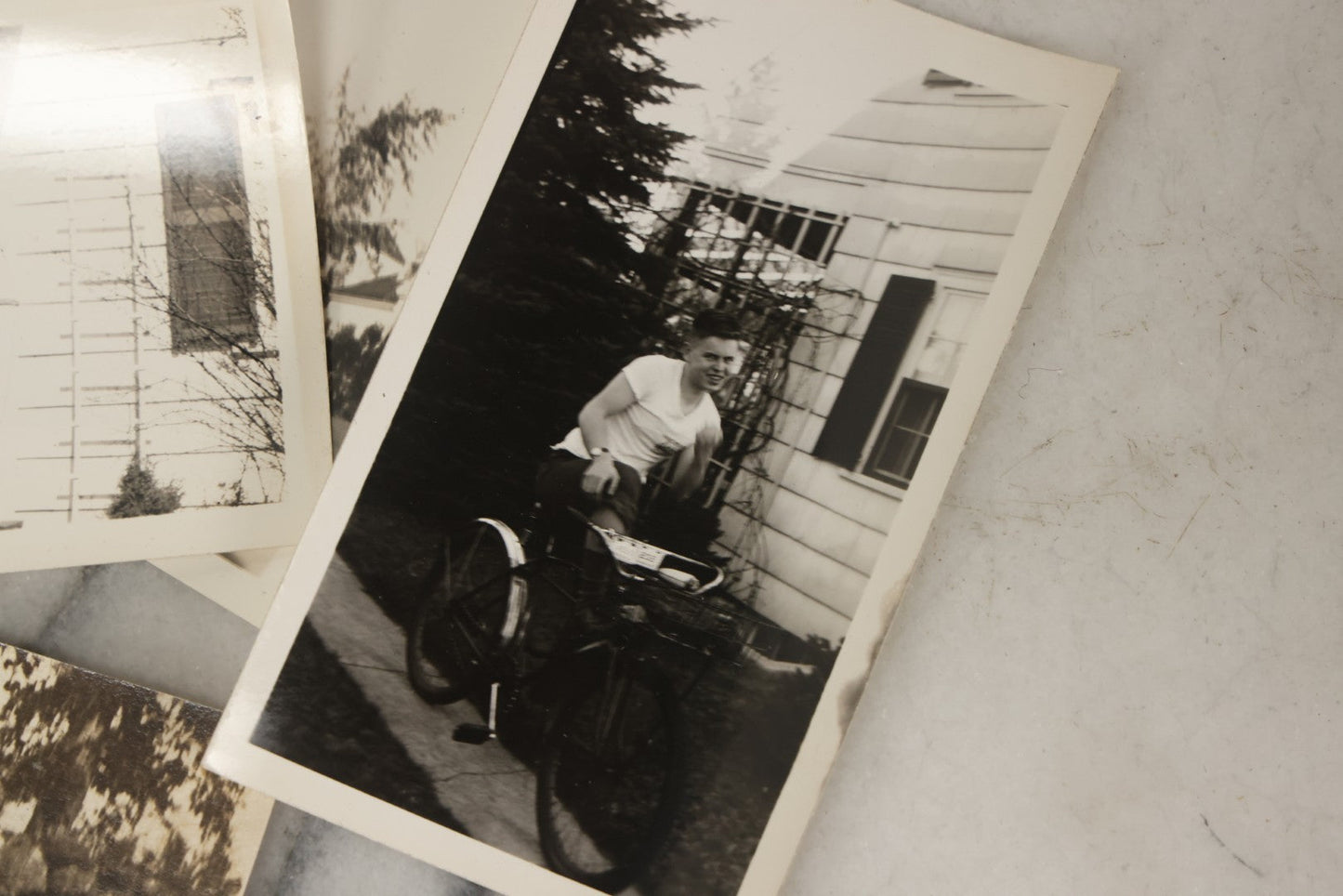 Lot 173 - Grouping Of 20+ Vintage And Antique Snapshot Photographs Including Boy With Baseball Bat, Boy With Bugle, Boy With Plane, Boy Riding Bike, Old Man In Stovepipe Hat, Etc.
