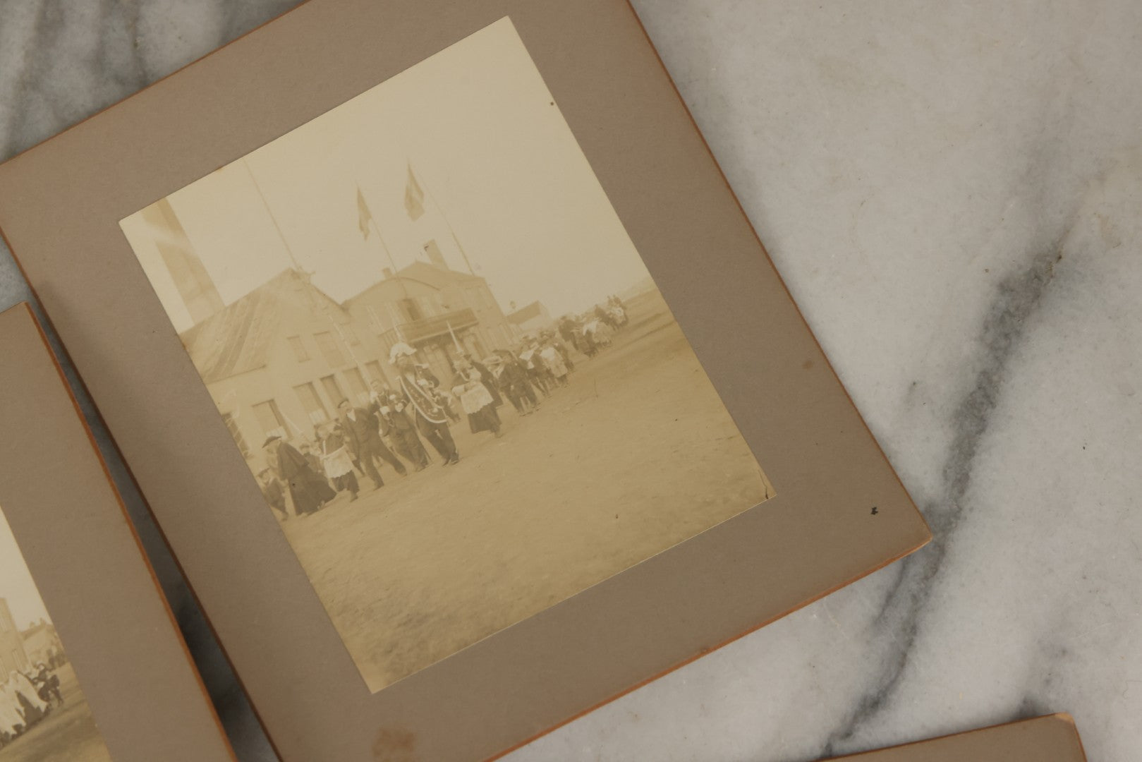 Lot 175 - Grouping Of Six Antique Boarded Photographs Of The Streets, People, Buildings, And Festivals Of Saint Pierre And Miquelon (French Territory Near Newfoundland, Canada)