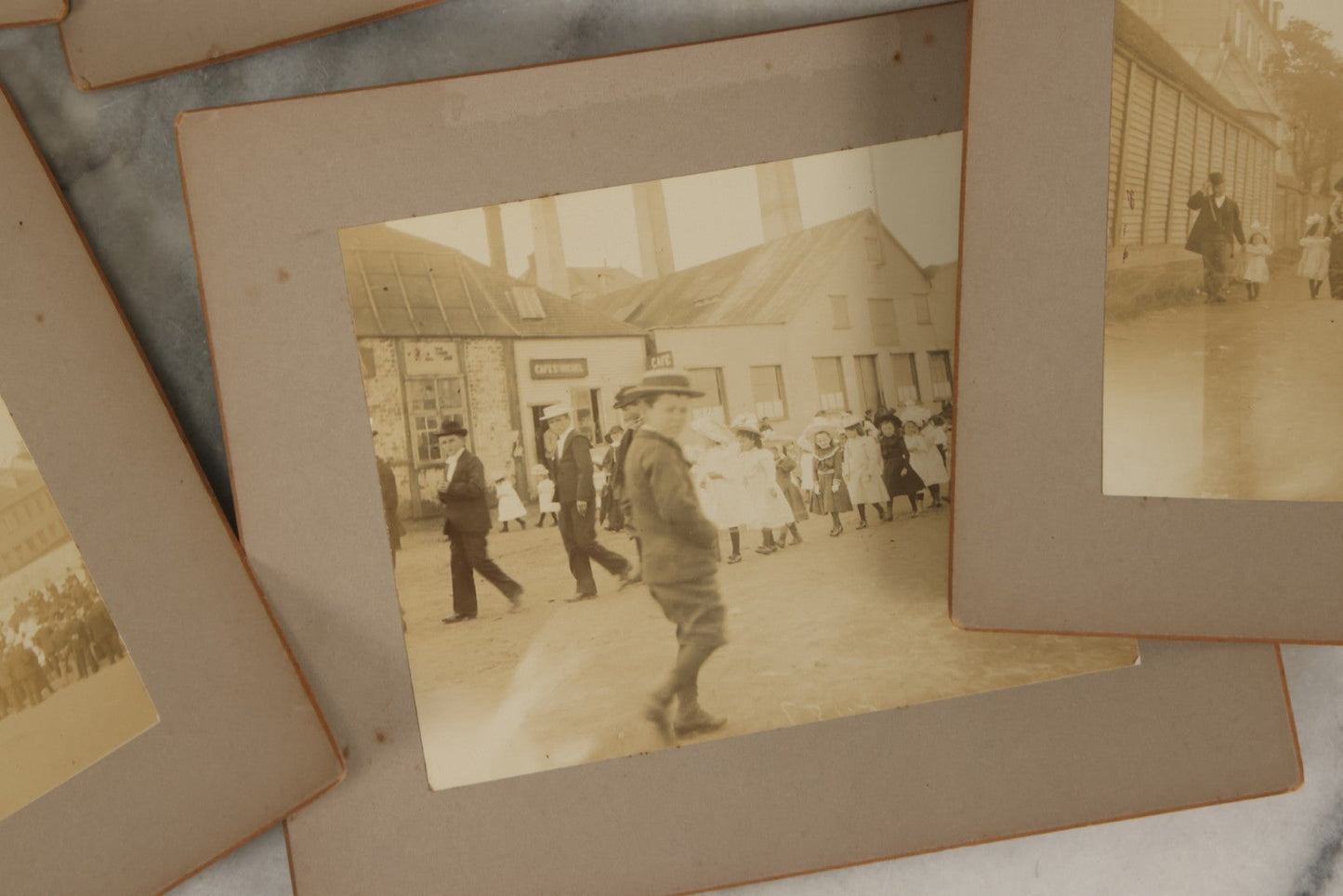 Lot 175 - Grouping Of Six Antique Boarded Photographs Of The Streets, People, Buildings, And Festivals Of Saint Pierre And Miquelon (French Territory Near Newfoundland, Canada)