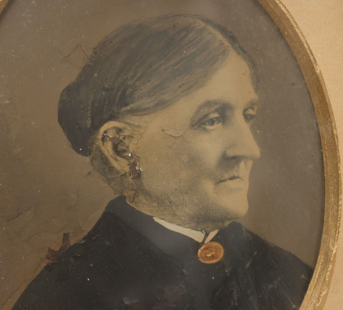 Lot 021 - Antique Full Plate Tintype Of An Elderly Woman With Hair Tied In A Bun, Gold Painted Jewelry, In Deep Frame, Note Wear, Rust, Losses, 11-7/8" x 13-7/8"