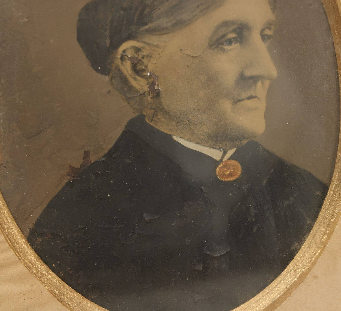 Lot 021 - Antique Full Plate Tintype Of An Elderly Woman With Hair Tied In A Bun, Gold Painted Jewelry, In Deep Frame, Note Wear, Rust, Losses, 11-7/8" x 13-7/8"