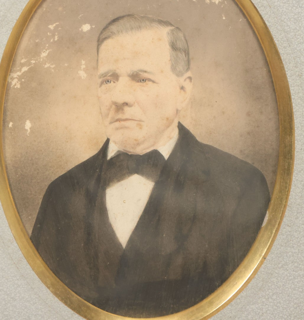 Lot 022 - Antique Over Painted Portrait Photo Of A Man With Gray Hair, Bowtie, In Deep Frame, Note Losses To Photo Surface, 11-7/8" x 13-7/8"