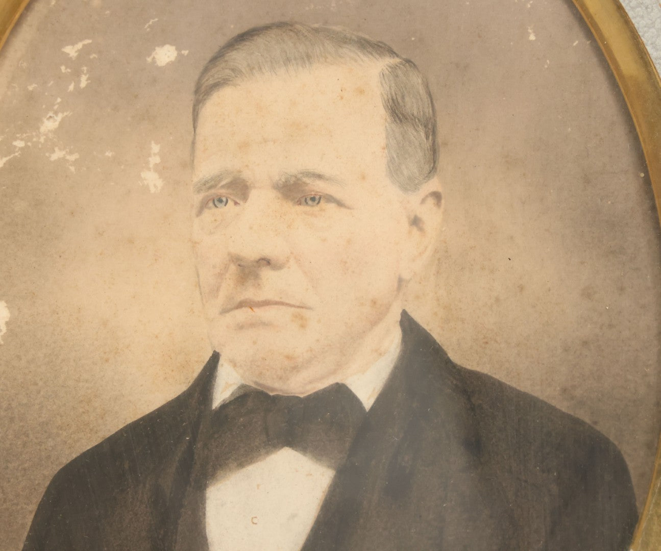 Lot 022 - Antique Over Painted Portrait Photo Of A Man With Gray Hair, Bowtie, In Deep Frame, Note Losses To Photo Surface, 11-7/8" x 13-7/8"