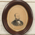Lot 023 - Antique Over Painted Portrait Photo Of A Man With A Beard, Receding Hairline, In Deep Oval Frame, 10-7/8" x 12-7/8"