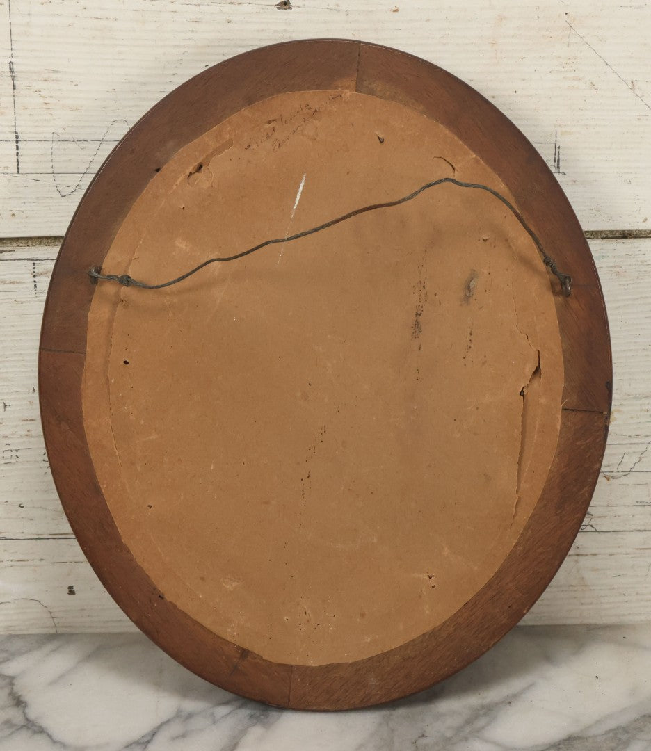 Lot 023 - Antique Over Painted Portrait Photo Of A Man With A Beard, Receding Hairline, In Deep Oval Frame, 10-7/8" x 12-7/8"