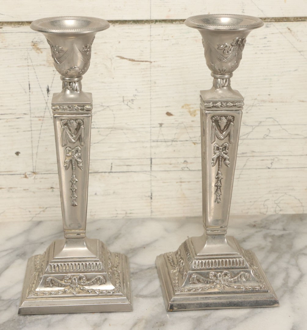 Lot 026 - Pair Of Vintage Silverplate Candlesticks, Neoclassical Design, Goat Head Motif, Ribbon And Garland Detailing