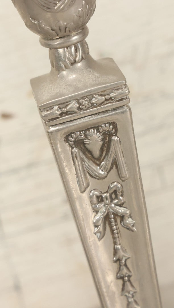 Lot 026 - Pair Of Vintage Silverplate Candlesticks, Neoclassical Design, Goat Head Motif, Ribbon And Garland Detailing