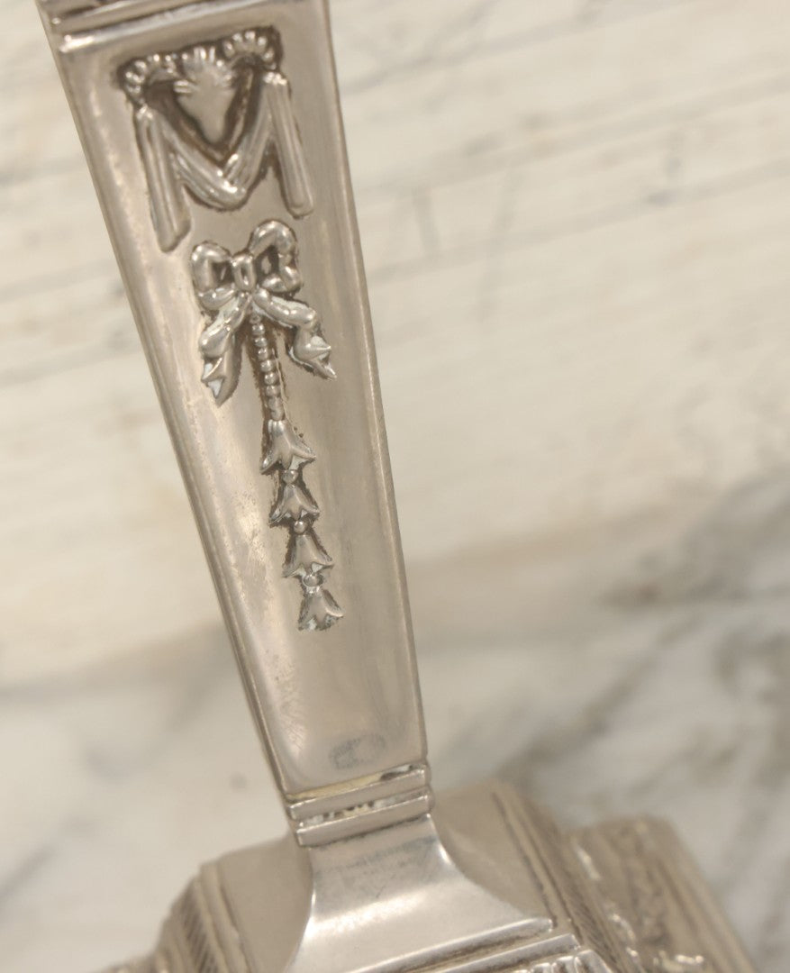 Lot 026 - Pair Of Vintage Silverplate Candlesticks, Neoclassical Design, Goat Head Motif, Ribbon And Garland Detailing