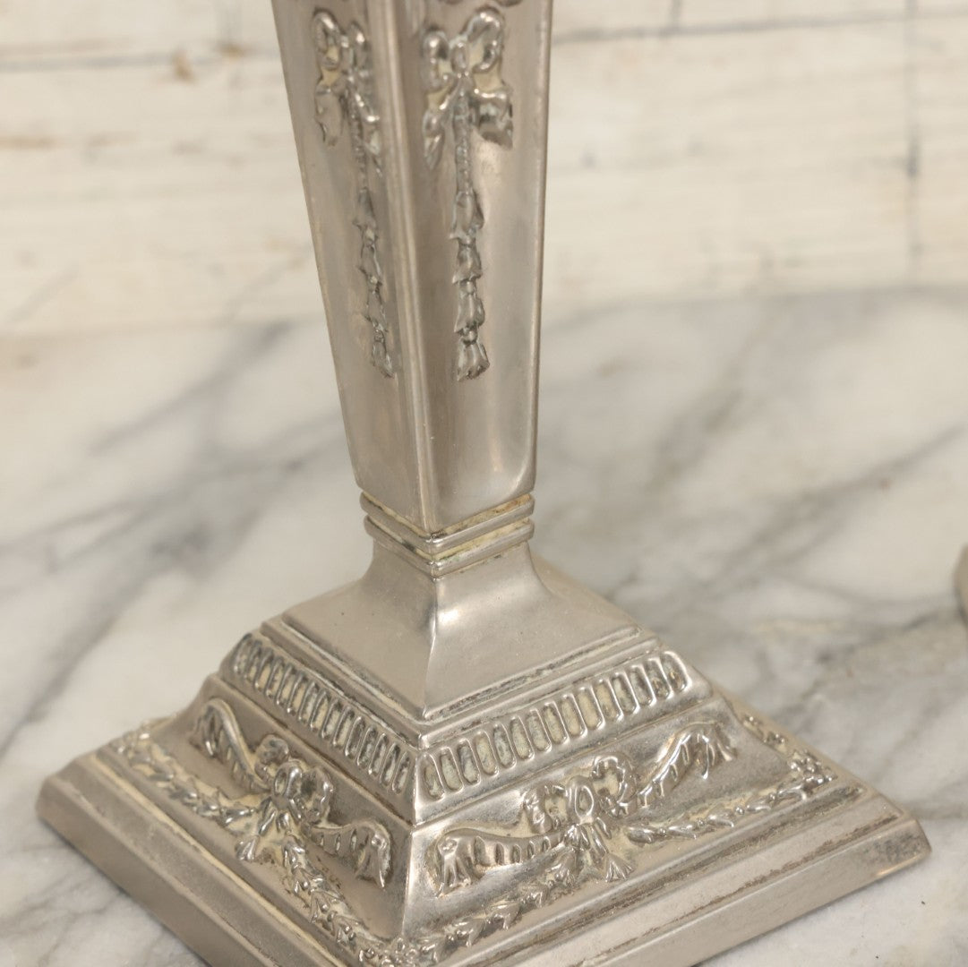 Lot 026 - Pair Of Vintage Silverplate Candlesticks, Neoclassical Design, Goat Head Motif, Ribbon And Garland Detailing