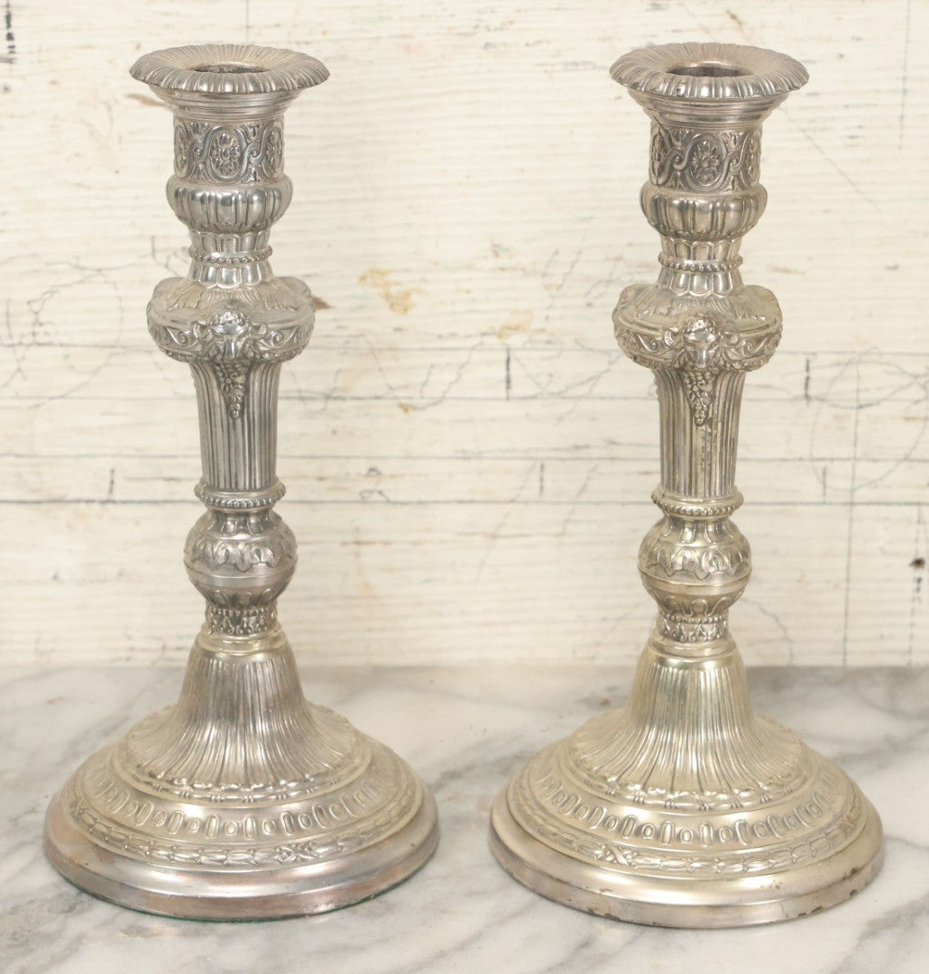 Lot 027 - Pair Of Vintage Raimond Silverplate Candlesticks, Ornate Baroque Style, Goat Head Motif, Made In Japan