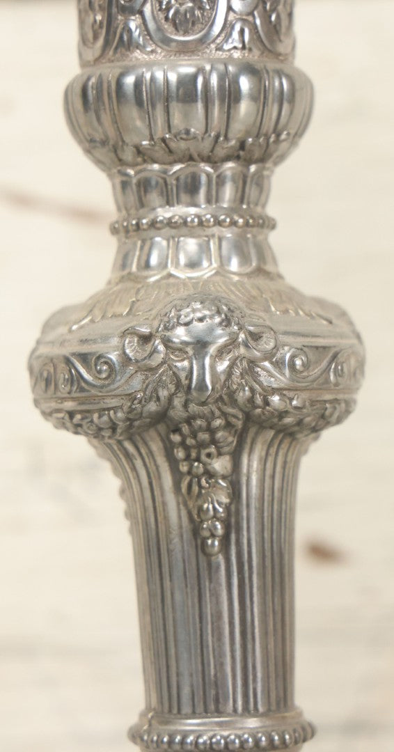 Lot 027 - Pair Of Vintage Raimond Silverplate Candlesticks, Ornate Baroque Style, Goat Head Motif, Made In Japan