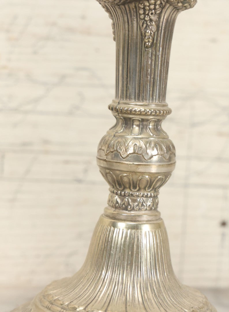 Lot 027 - Pair Of Vintage Raimond Silverplate Candlesticks, Ornate Baroque Style, Goat Head Motif, Made In Japan