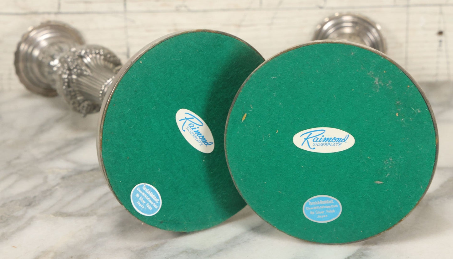 Lot 027 - Pair Of Vintage Raimond Silverplate Candlesticks, Ornate Baroque Style, Goat Head Motif, Made In Japan