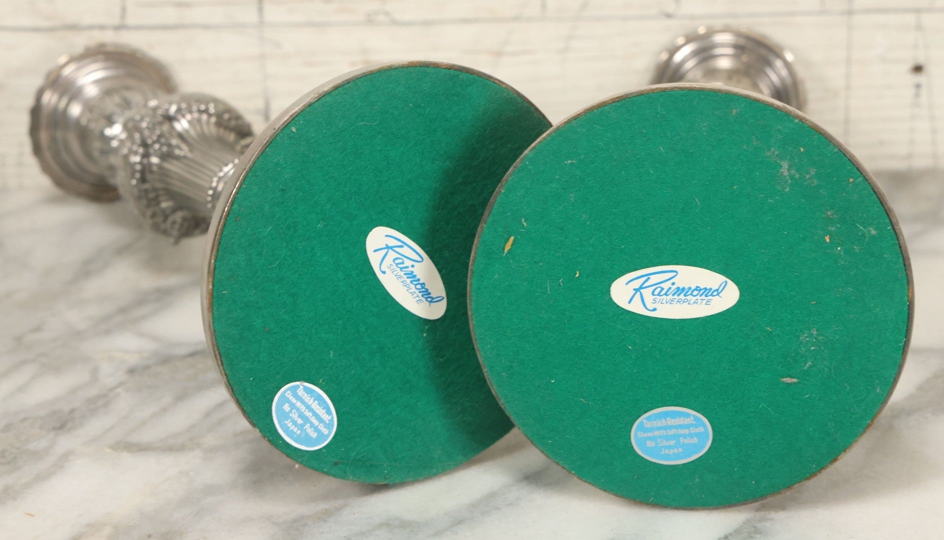 Lot 027 - Pair Of Vintage Raimond Silverplate Candlesticks, Ornate Baroque Style, Goat Head Motif, Made In Japan