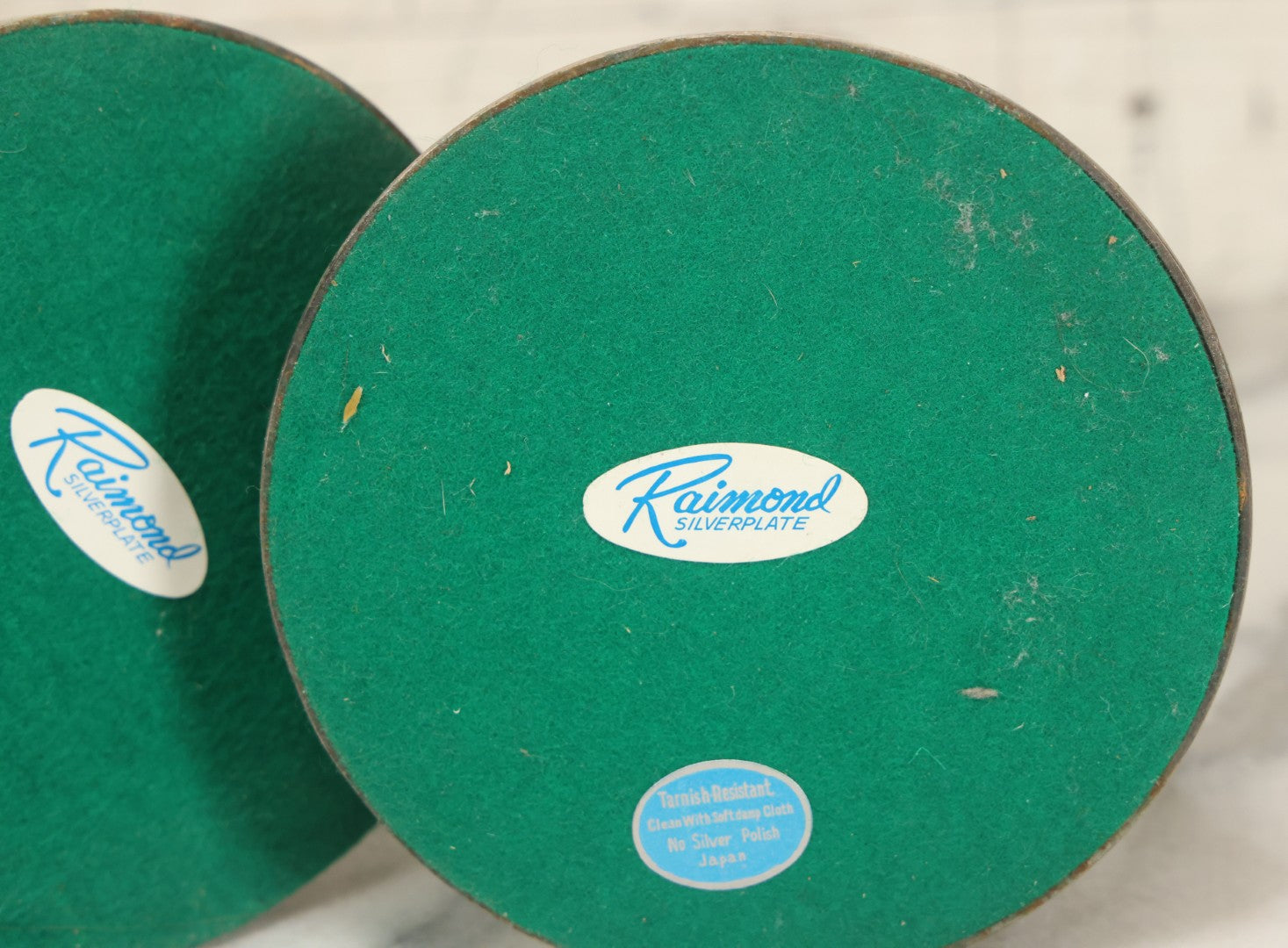 Lot 027 - Pair Of Vintage Raimond Silverplate Candlesticks, Ornate Baroque Style, Goat Head Motif, Made In Japan