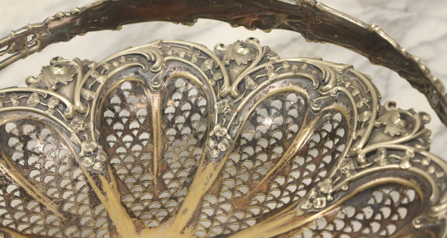 Lot 028 - Antique Silverplate Pierced Basket, Ornate Rococo Style, Footed Base With Hinged Handle, Tarnished Patina