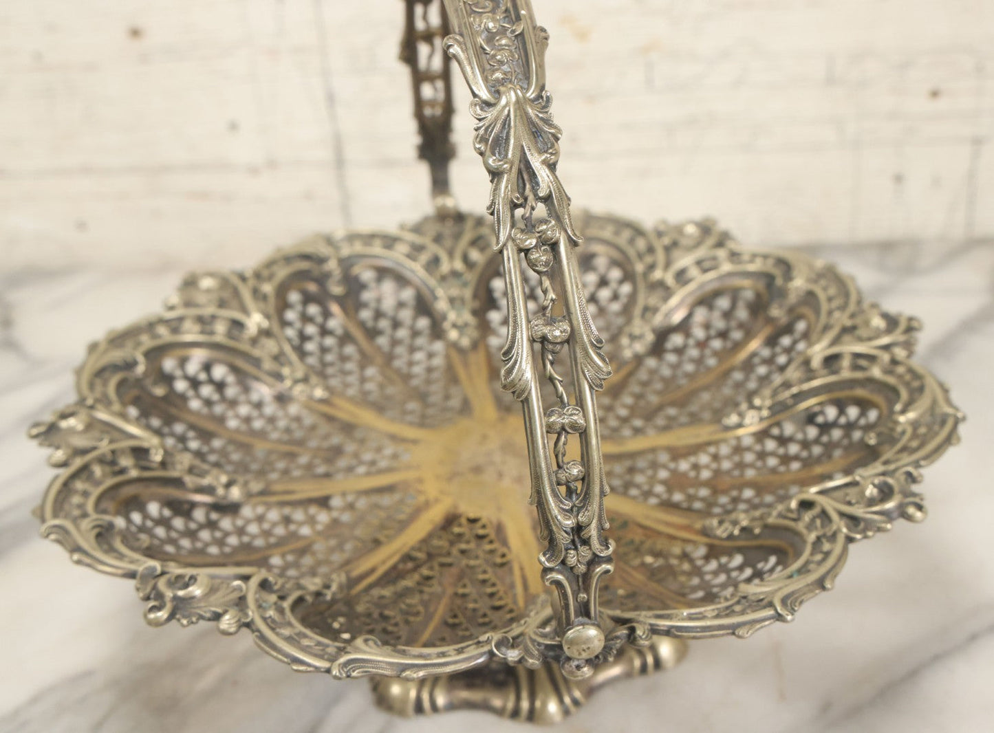 Lot 028 - Antique Silverplate Pierced Basket, Ornate Rococo Style, Footed Base With Hinged Handle, Tarnished Patina