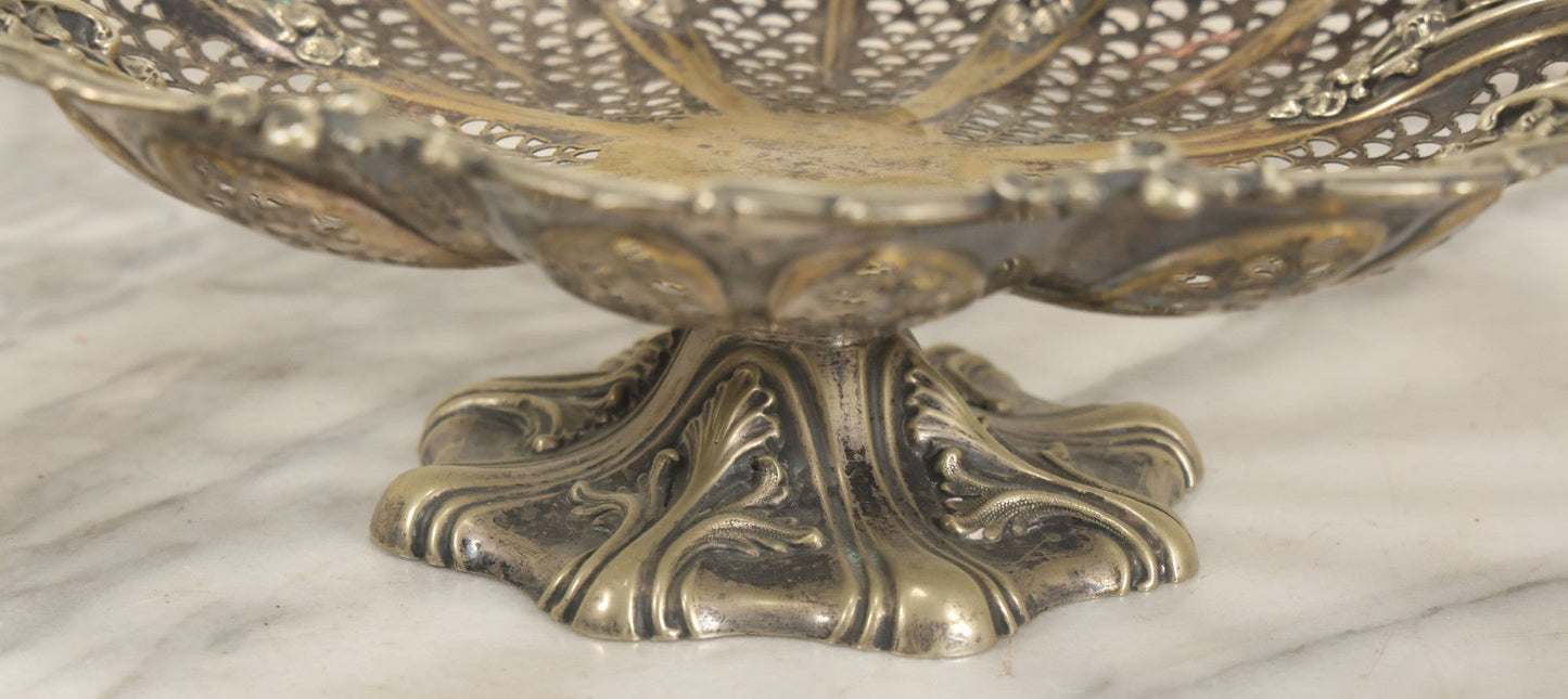 Lot 028 - Antique Silverplate Pierced Basket, Ornate Rococo Style, Footed Base With Hinged Handle, Tarnished Patina