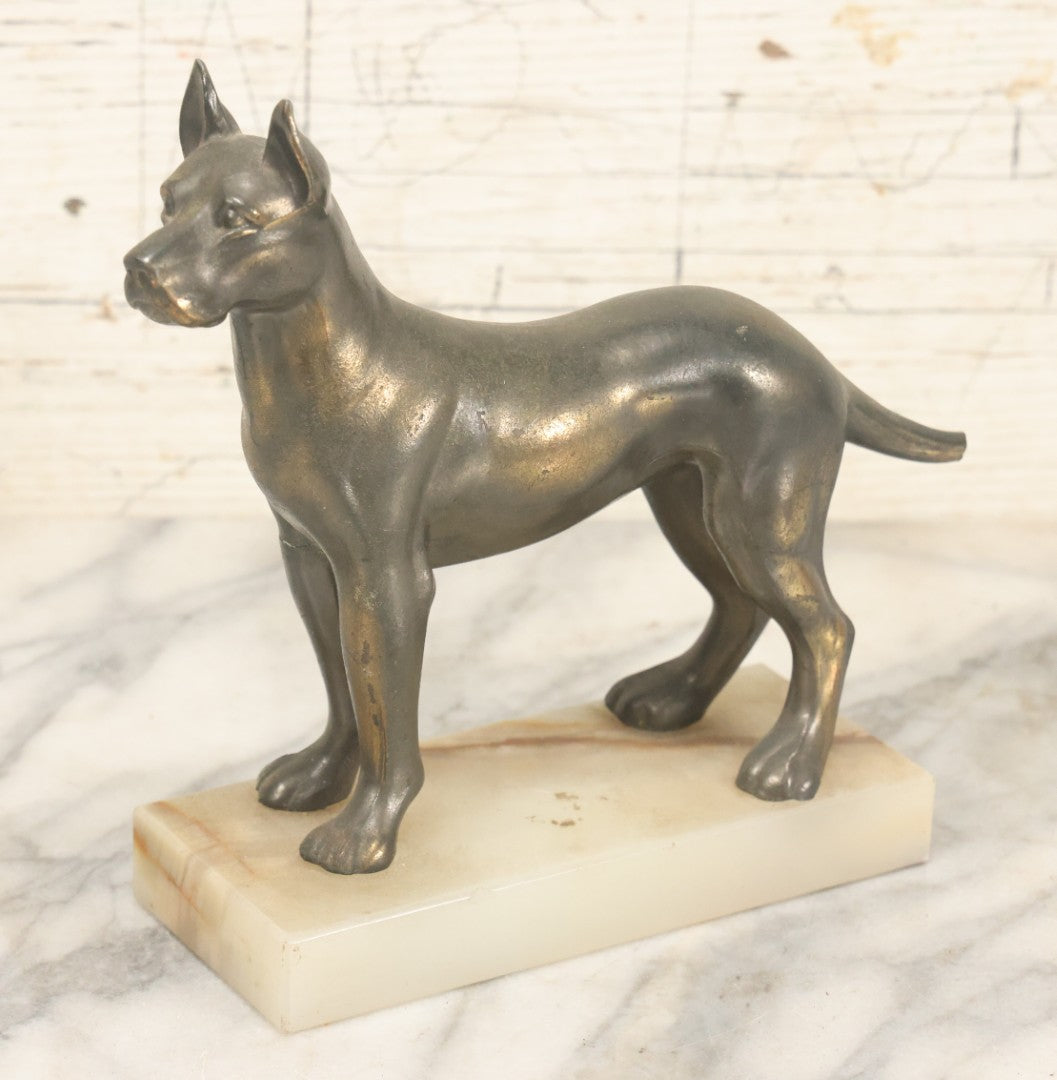 Lot 037 - Vintage Cast Metal Great Dane Dog Figurine, Mounted On Alabaster Base, Note Loss To Tail, Cracked Repaired Leg