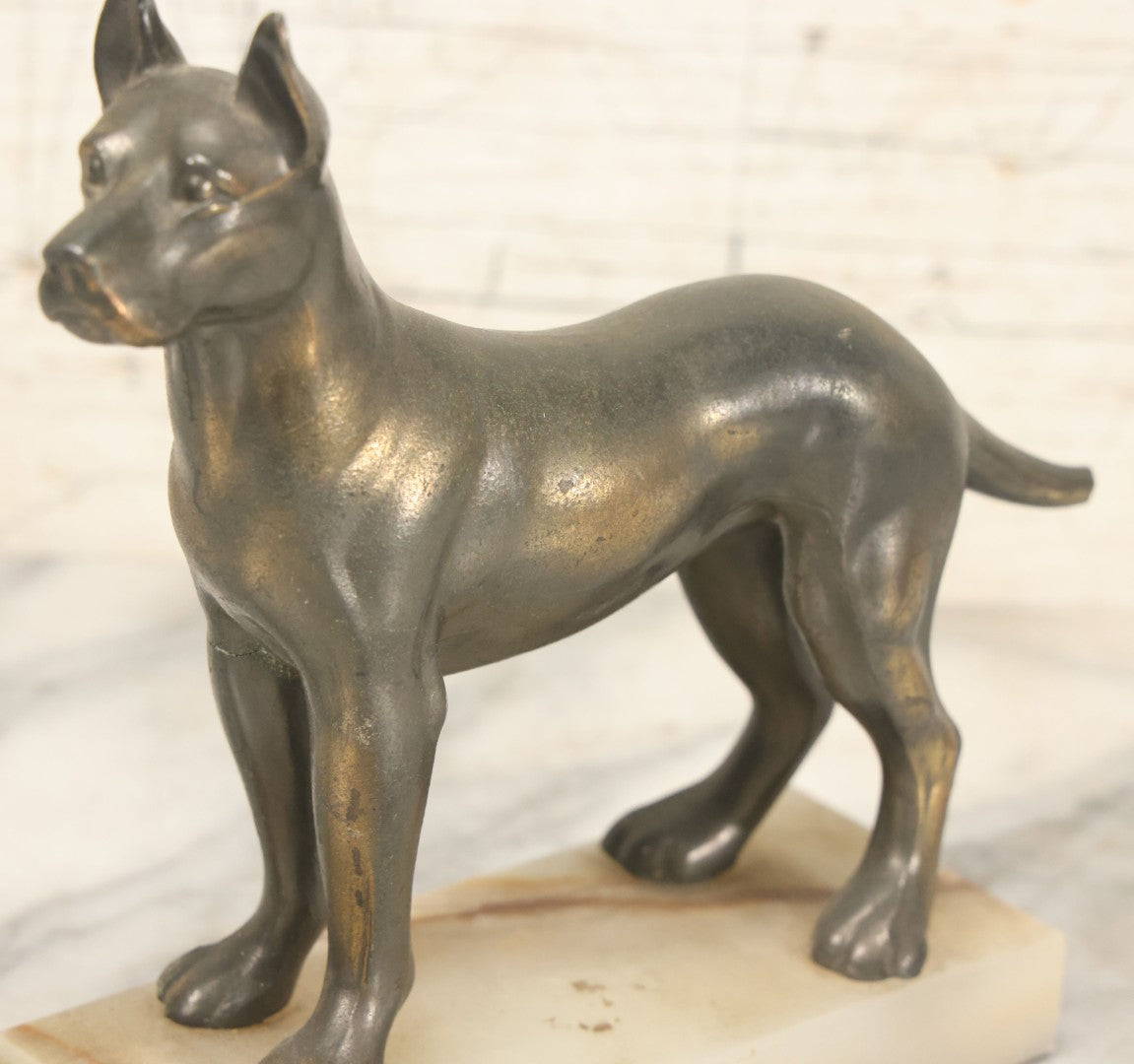 Lot 037 - Vintage Cast Metal Great Dane Dog Figurine, Mounted On Alabaster Base, Note Loss To Tail, Cracked Repaired Leg