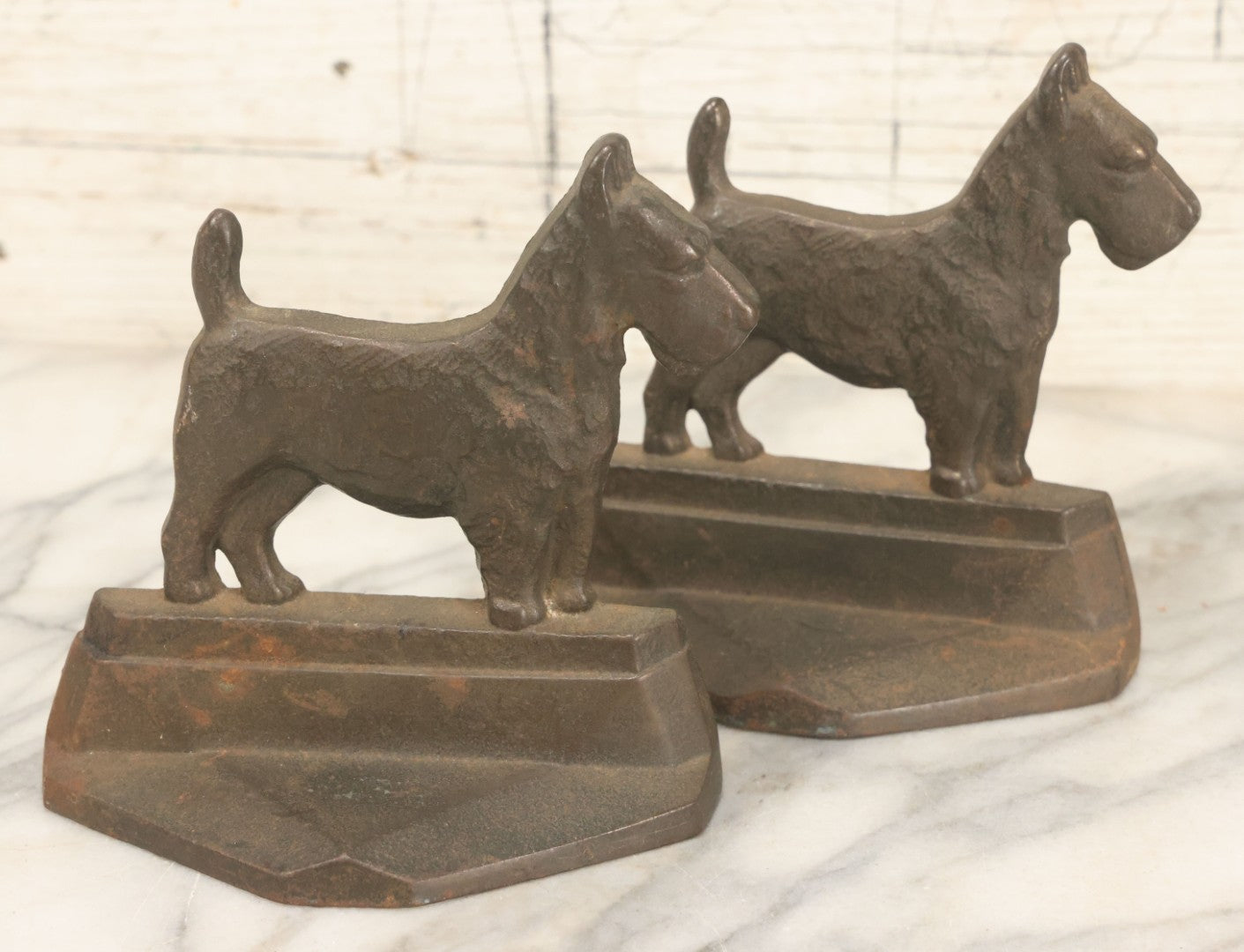 Lot 039 - Pair Of Antique Cast Iron Scottie Dog Bookends, Geometric Design, Aged Finish