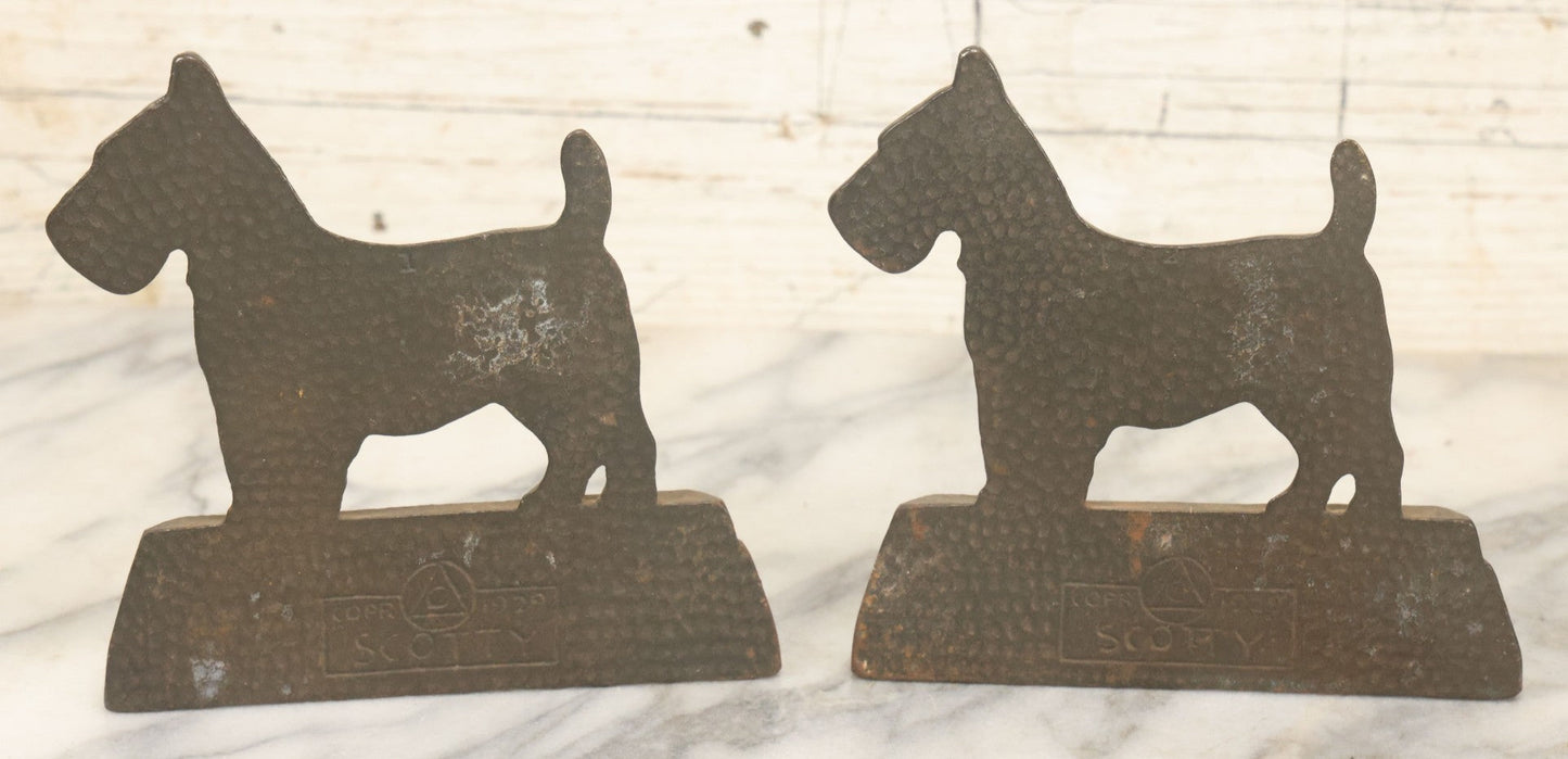 Lot 039 - Pair Of Antique Cast Iron Scottie Dog Bookends, Geometric Design, Aged Finish