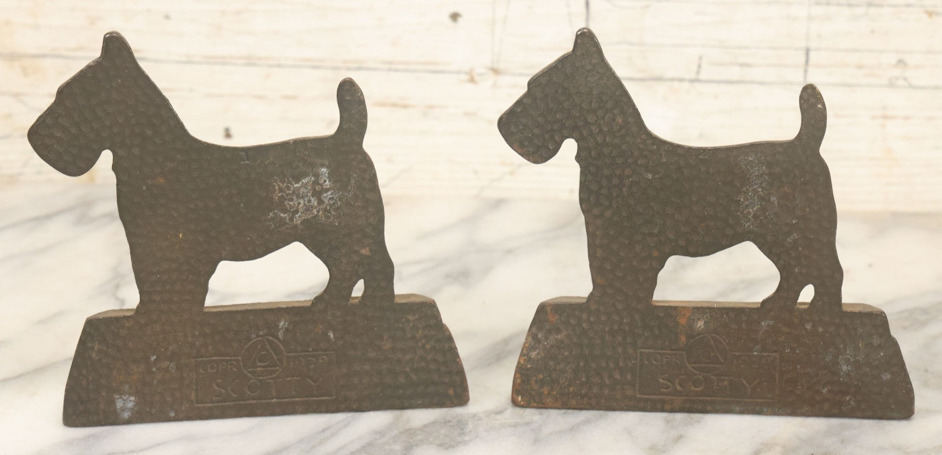 Lot 039 - Pair Of Antique Cast Iron Scottie Dog Bookends, Geometric Design, Aged Finish