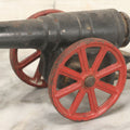 Lot 041 - Antique Cast Iron Cannon, Red Spoked Wheels, Early 20th Century