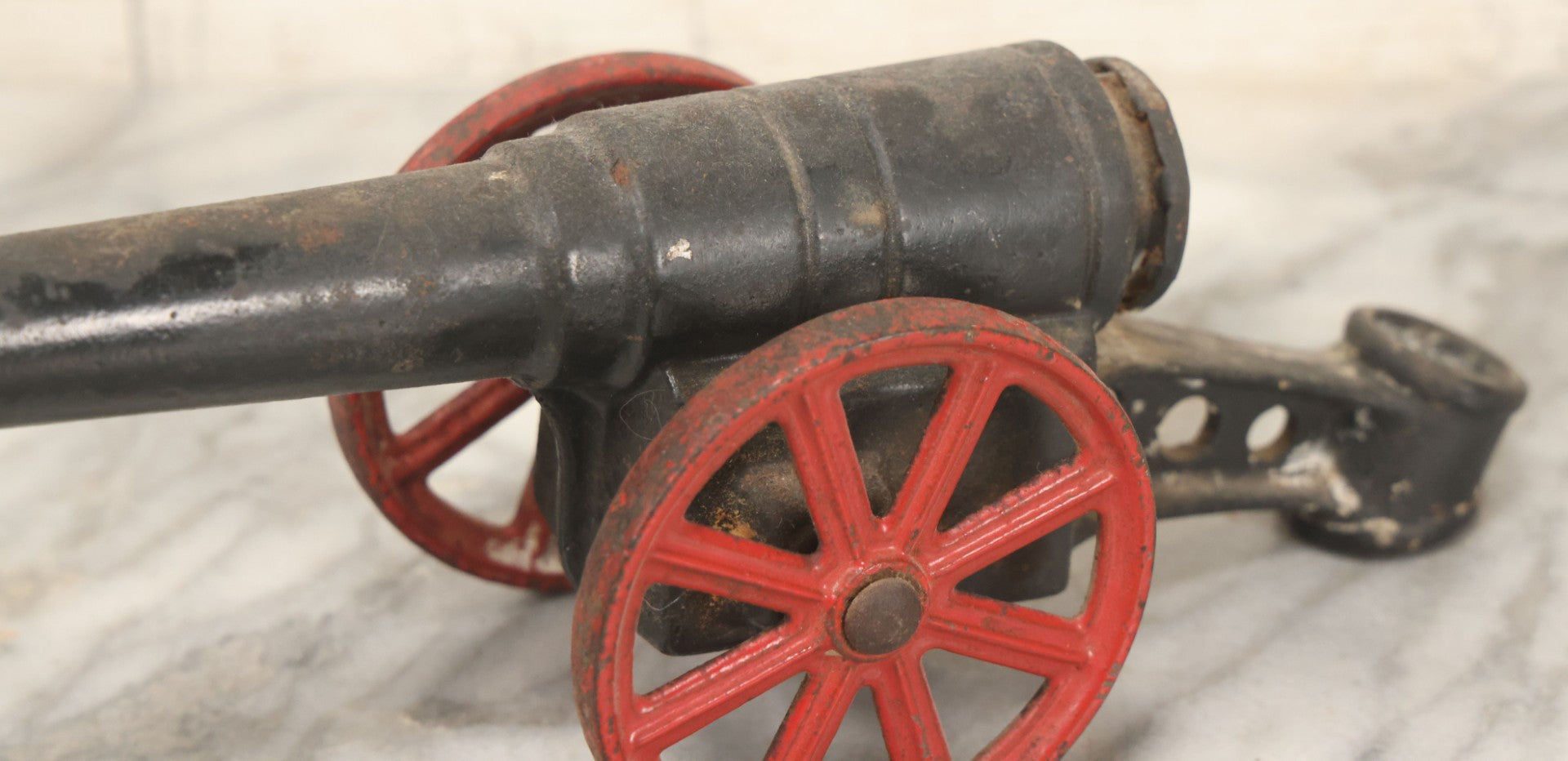 Lot 041 - Antique Cast Iron Cannon, Red Spoked Wheels, Early 20th Century
