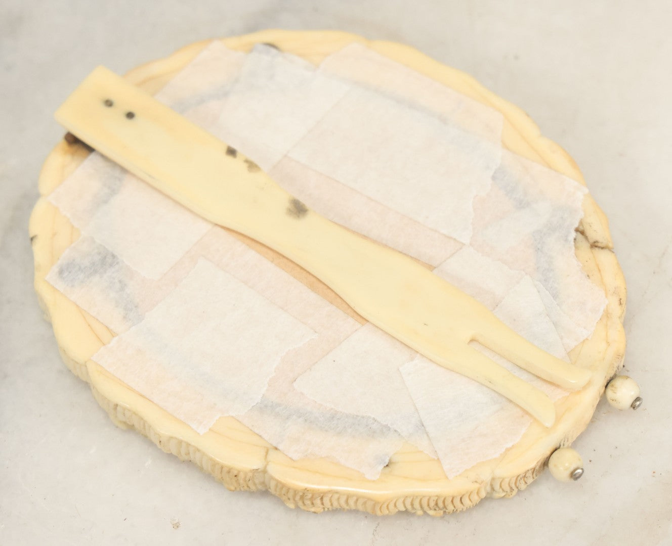 Lot 046 - Antique Painted Over Photo Portrait Miniature Of A Woman, Signed Lopez, In Ornate Carved Scrimshaw Bone Floral Frame, Note Repairs