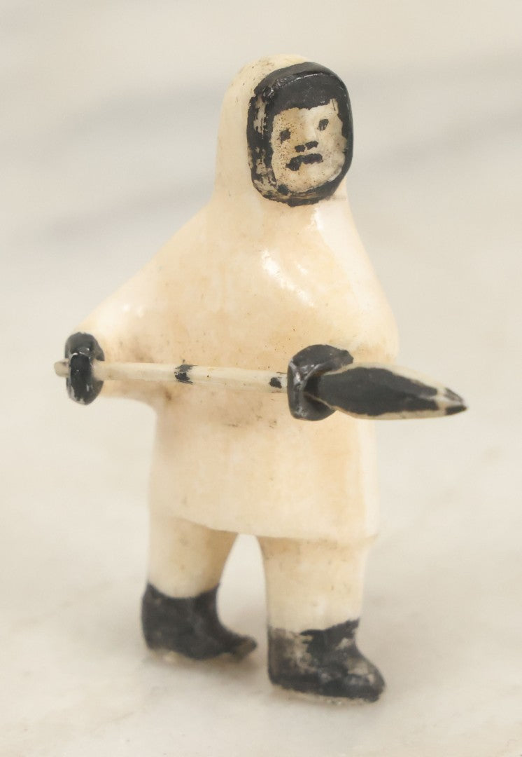Lot 047 - Vintage Inuit Carved Scrimshaw Bone Figurine, Hunter With Spear, Black And White Painted Details