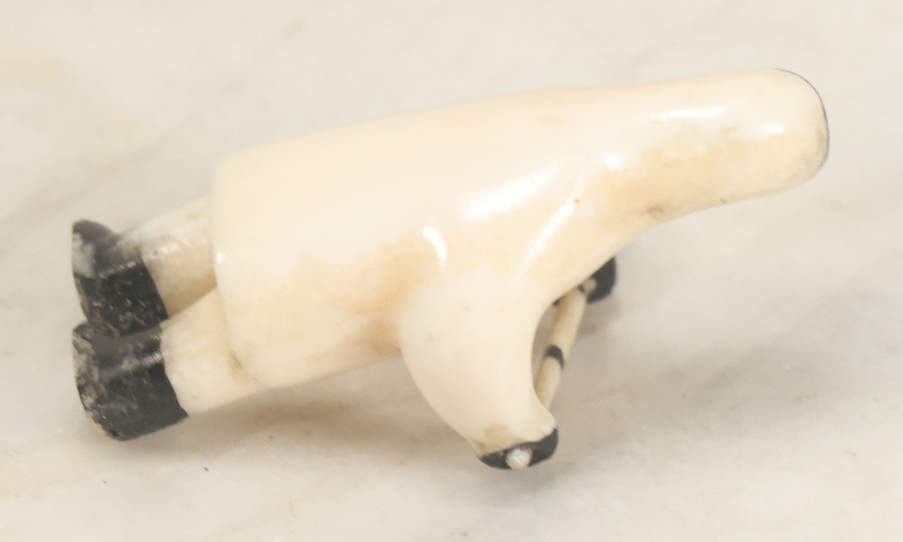Lot 047 - Vintage Inuit Carved Scrimshaw Bone Figurine, Hunter With Spear, Black And White Painted Details