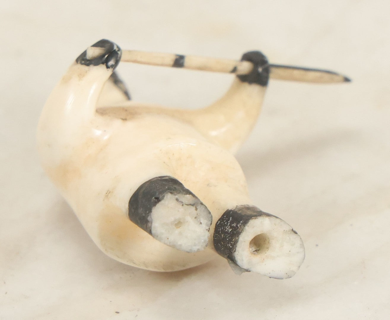 Lot 047 - Vintage Inuit Carved Scrimshaw Bone Figurine, Hunter With Spear, Black And White Painted Details